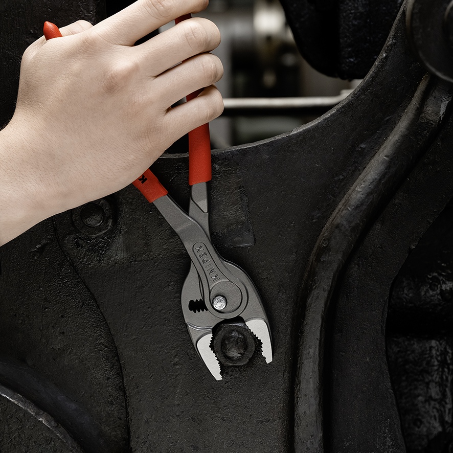 Клещи с фронтальным и боковым захватами зев 5-27 мм, длина 250 мм, обливные ручки TwinGrip KN-8201250