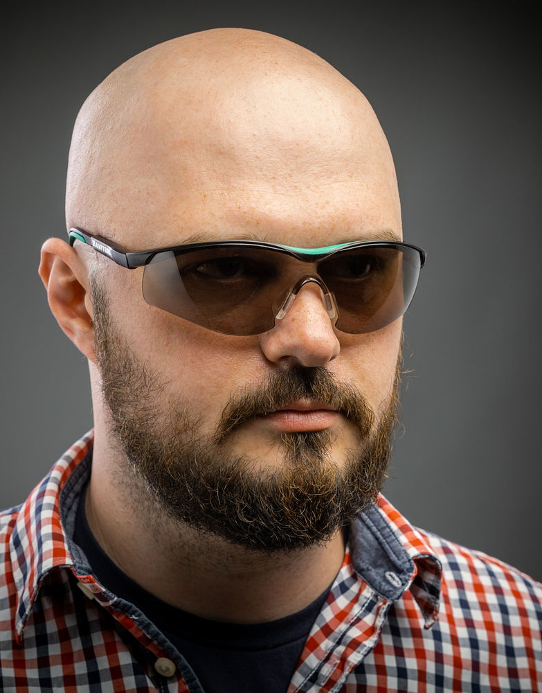 Защитные очки BASIC, открытого типа, коричневые, стекло-моноблок с покрытием устойчивым к истиранию и запотеванию KRAFTOOL 110319